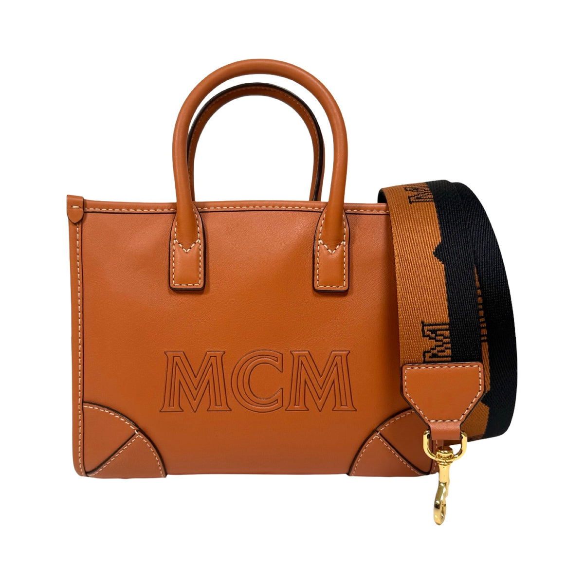 MCM Munchen Spanish Leather Mini Tote In Cognac | FOMO