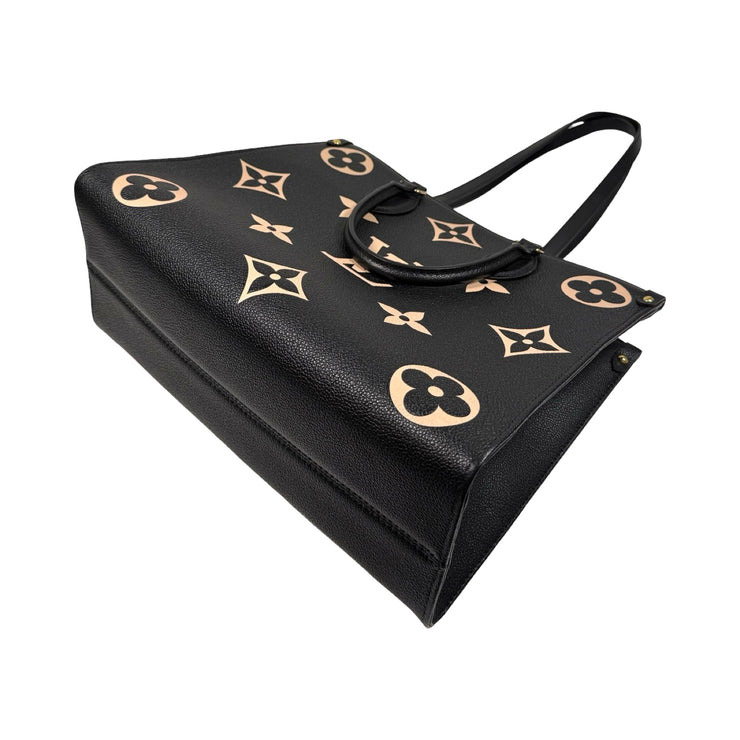 Louis Vuitton - Bicolor Giant Monogram Empreinte OnTheGo MM