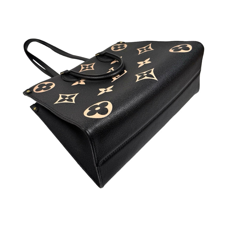 Louis Vuitton - Bicolor Giant Monogram Empreinte OnTheGo MM